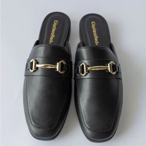 Cityclassified Slip-On Mules with Gold Buckles in Black Faux Leather